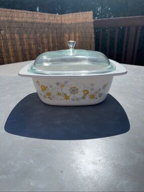 White Ceramic Casserole Dish with Yellow Floral Pattern and Glass Lid